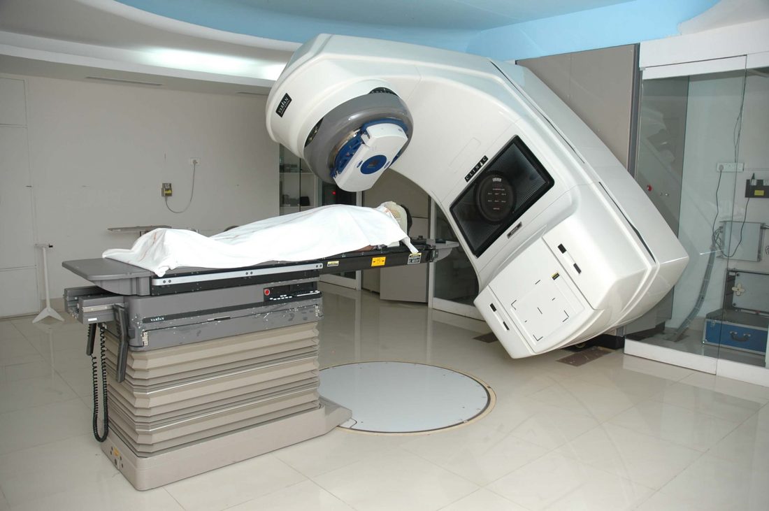 Radiotherapy treatment room with scanning equipment