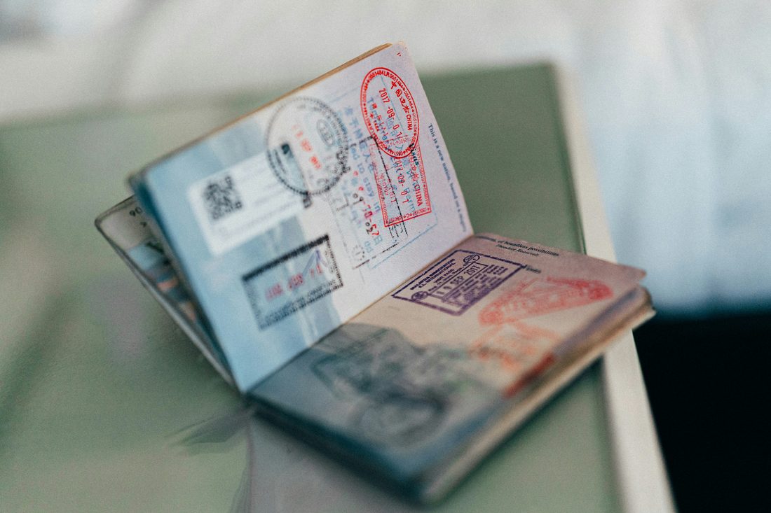Passport open showing visa stamps